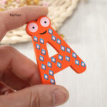 Set-Cifre-si-litere-din-lemn-magnetice-Ochi2