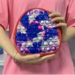 Ghiozdan gradinita colorat copii Jucarie Pop It curele reglabile4