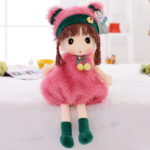 Papusa moale cu codite si rochita Jucarie plus Baby Doll