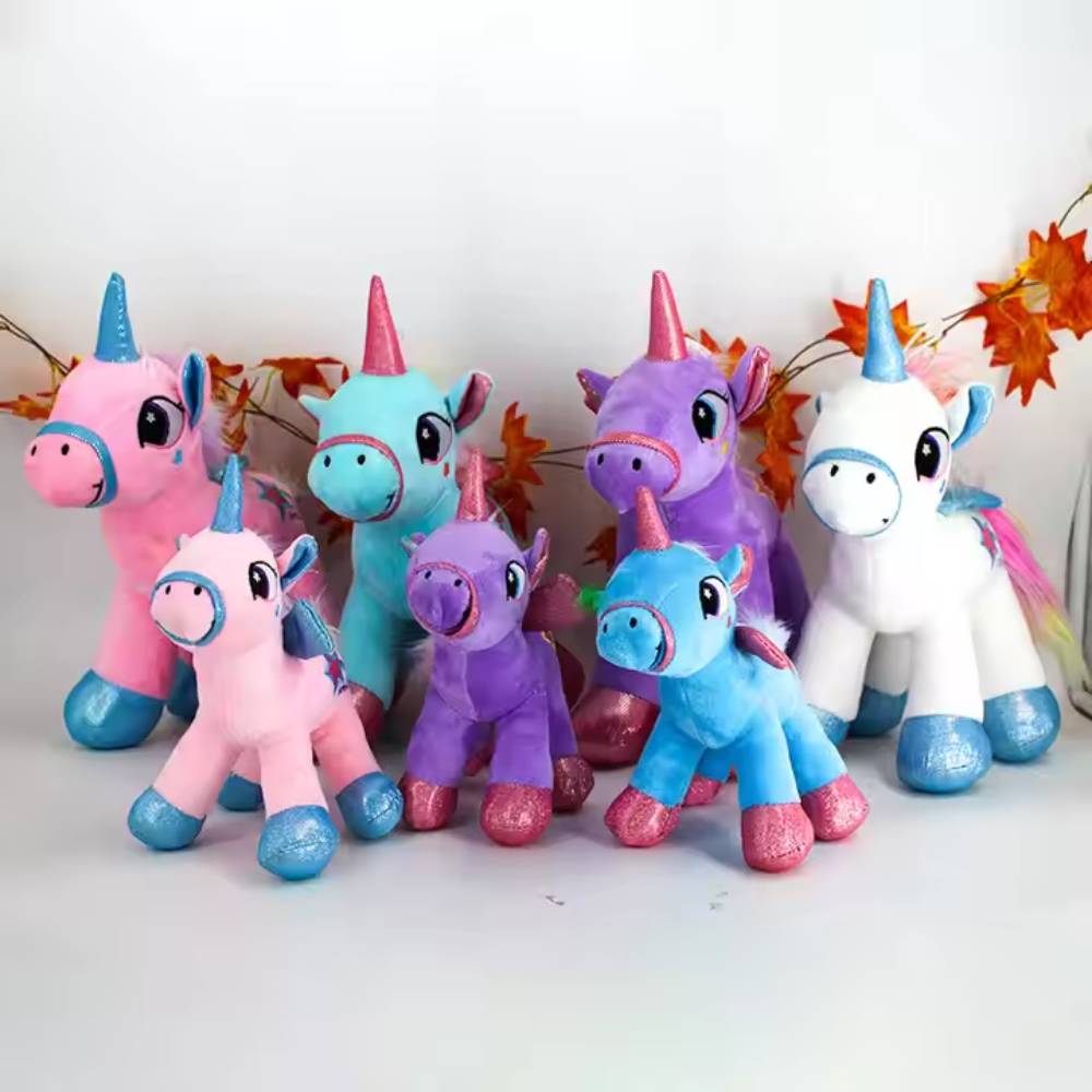 Jucarie plus Unicorn Muzical Curcubeu cu aripi si sclipici 20 cm