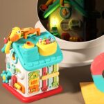 Casuta interactiva Montessori Busy Board cu Volan si incuietori